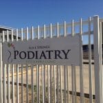 Business Sign on Gate — Podiatrists in Alice Springs, NT