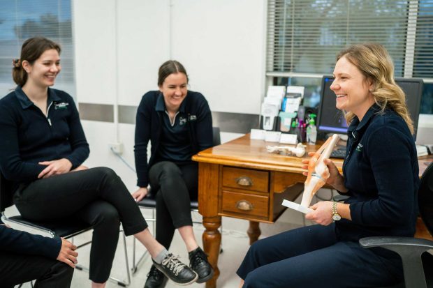 A Group Of People Laughing — Podiatrists in Alice Springs, NT